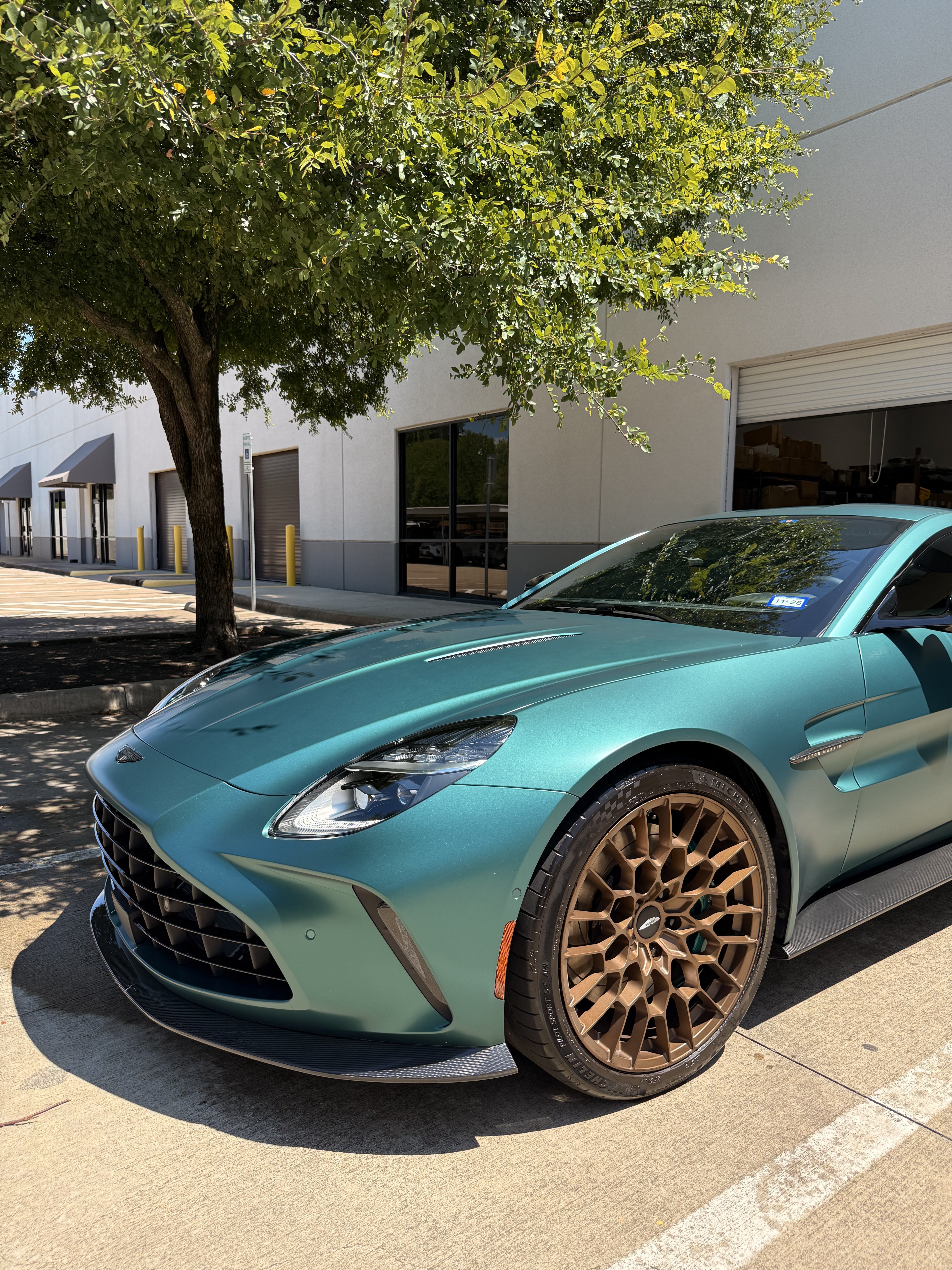 Aston Martin Vantage in racing green exterior after detail